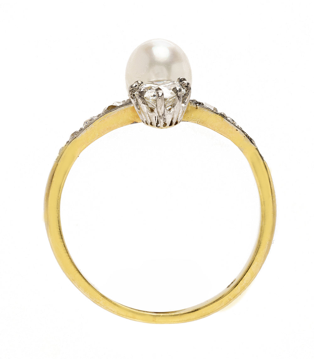 Belle of the Ball VC-R174 gold ring with prong-set clear center stone and sparkling halo setting