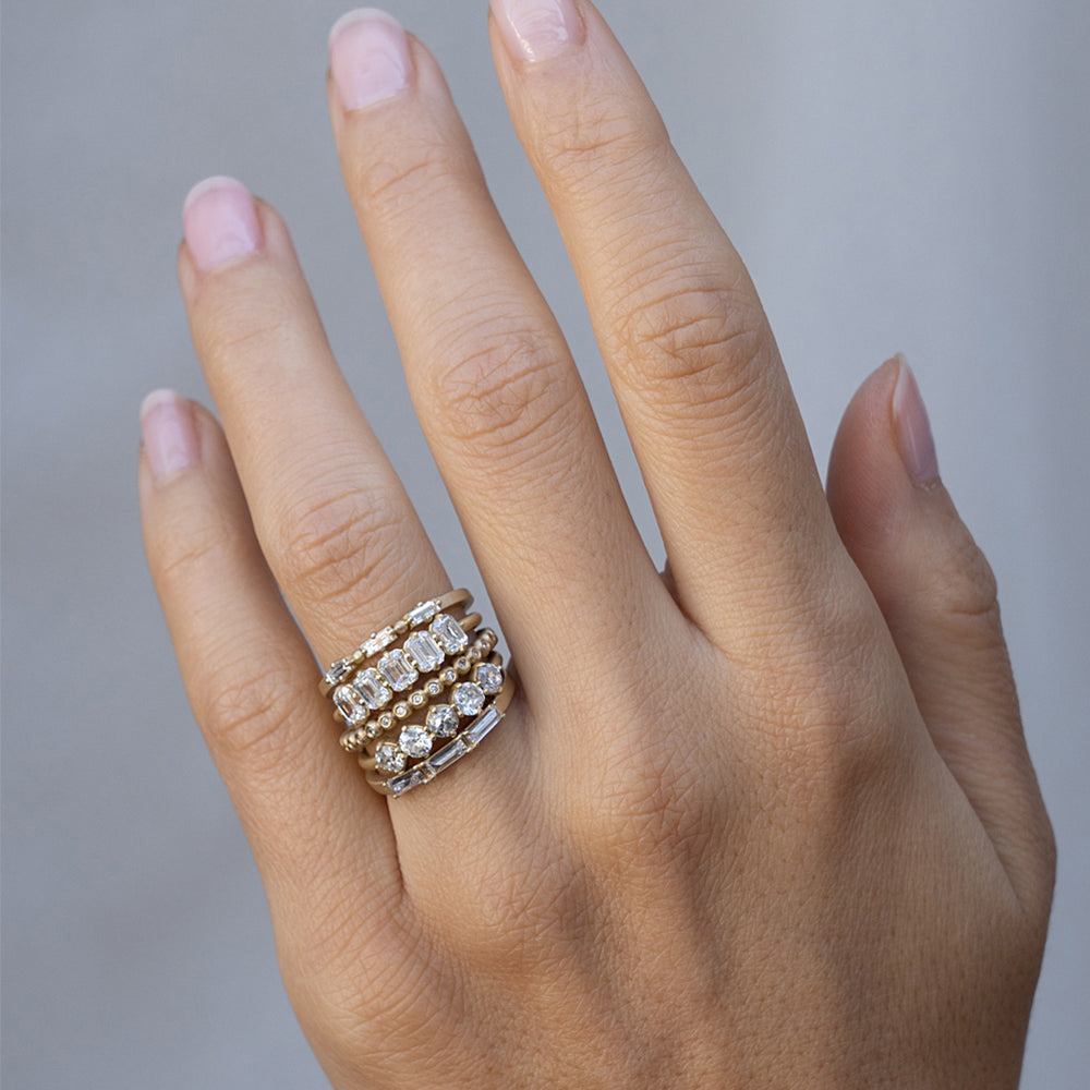 Claudette 5 Stone Band SK-R68-Band-1.68 gold diamond 5-stone band ring on hand, soft studio light