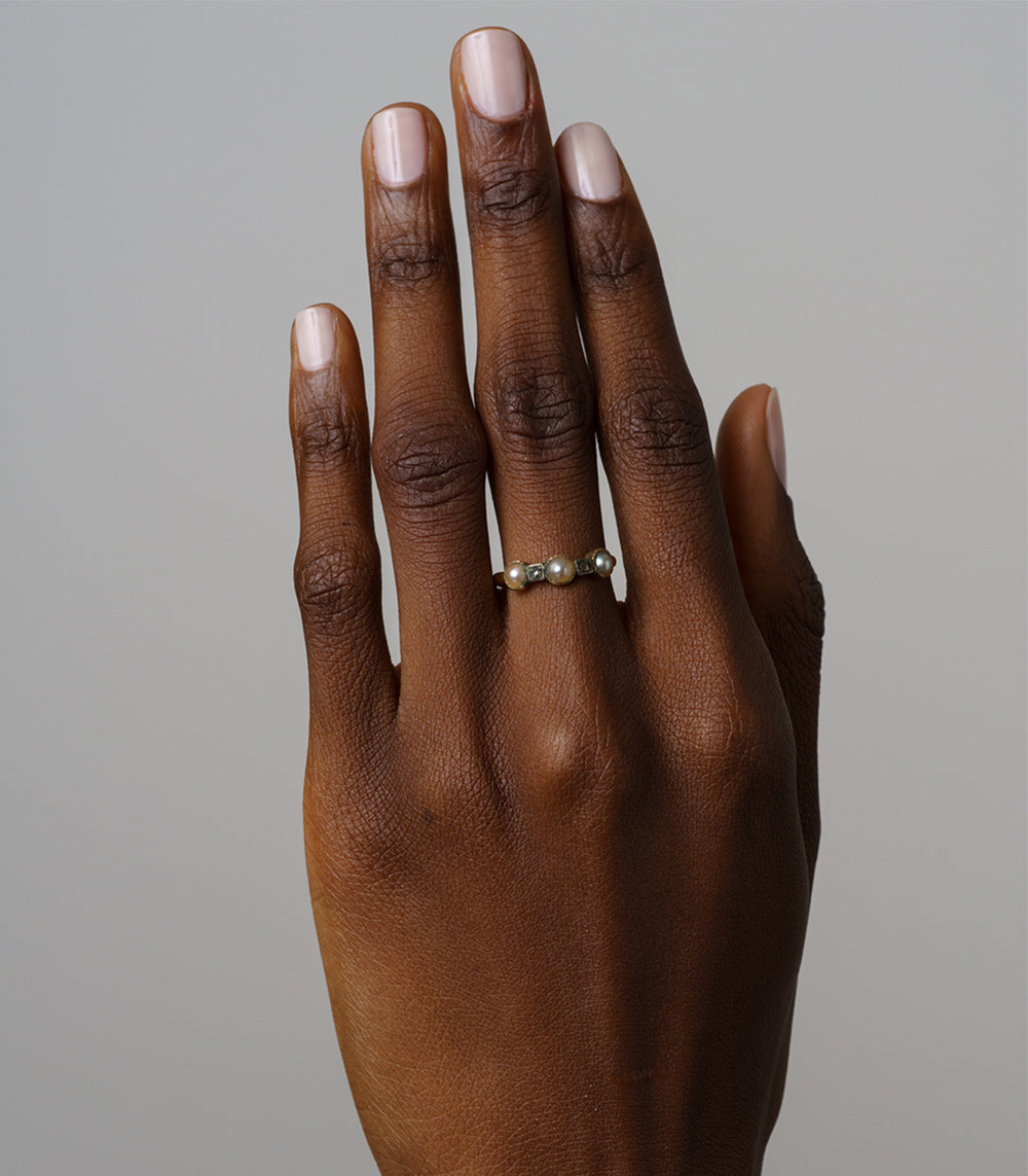 Pearl and Diamond Vintage Stacking Band I VC-R165 pearl and diamond stacking ring in silver-toned setting on hand