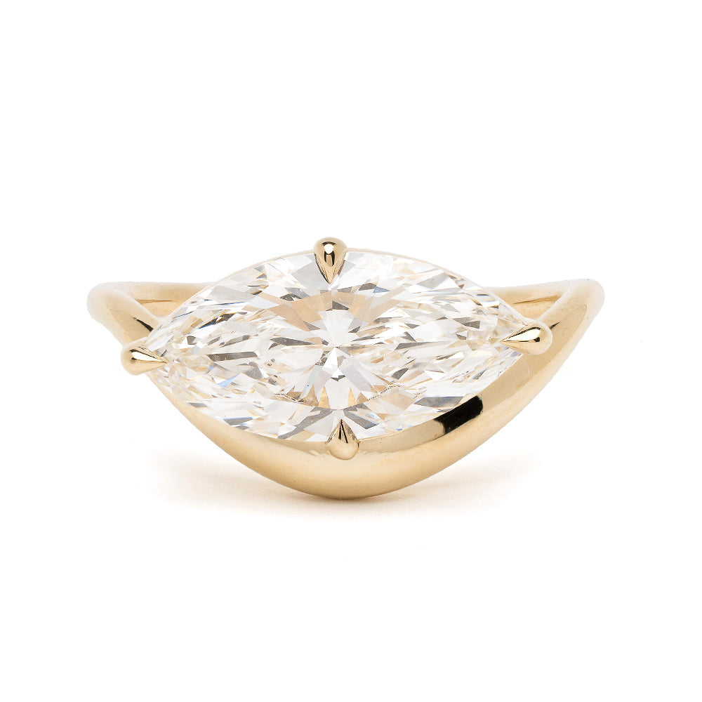 Melt Solitaire by Sofia Kaman yellow gold solitaire engagement ring with marquise diamond setting