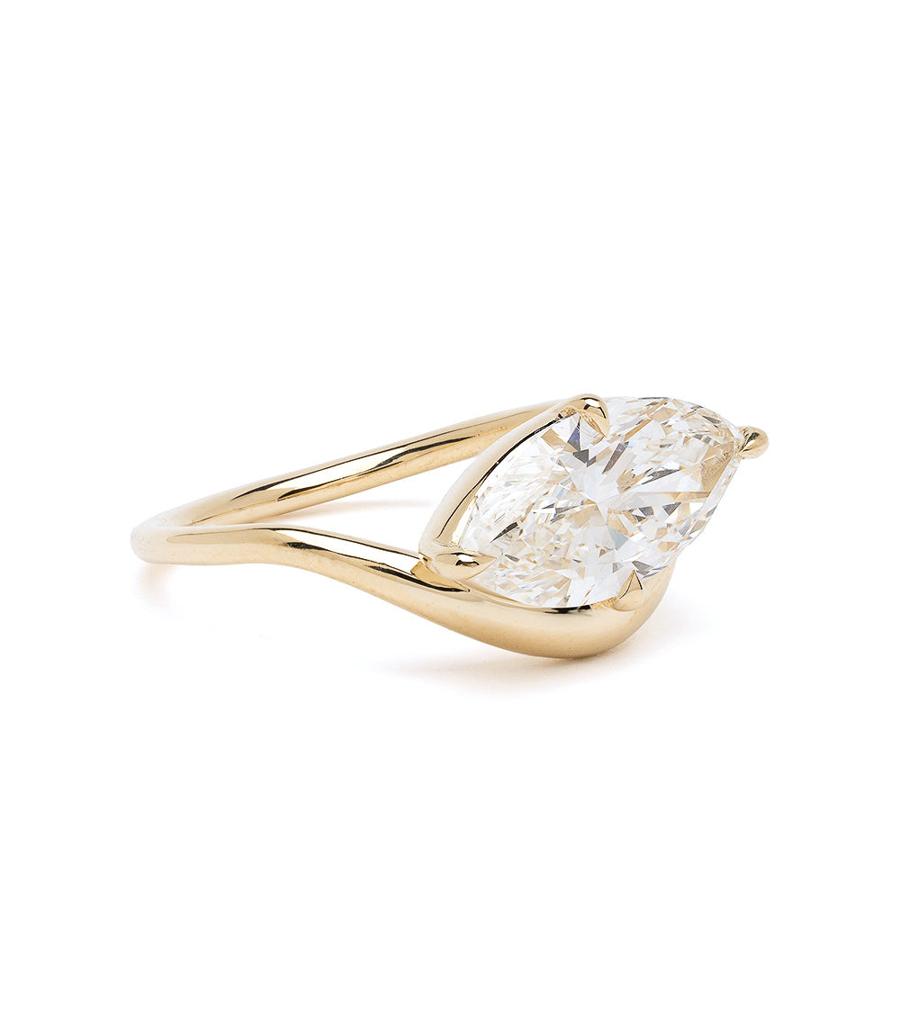 Melt Solitaire Sofia Kaman engagement ring in gold with oval-cut diamond solitaire, bright studio lighting