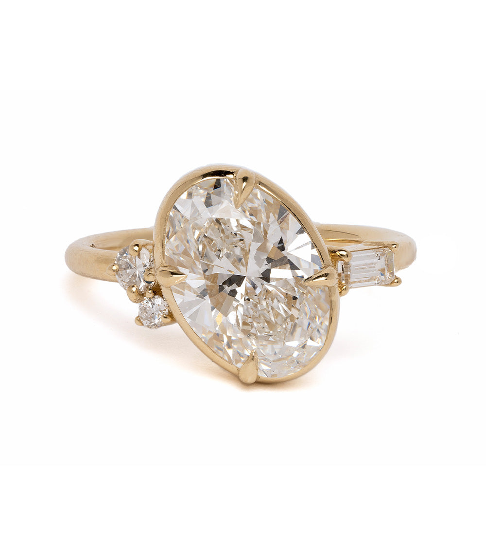 Sydney by SK-R96-LGD-OC-3.01 gold 3 stone engagement ring with oval center diamond and side stones