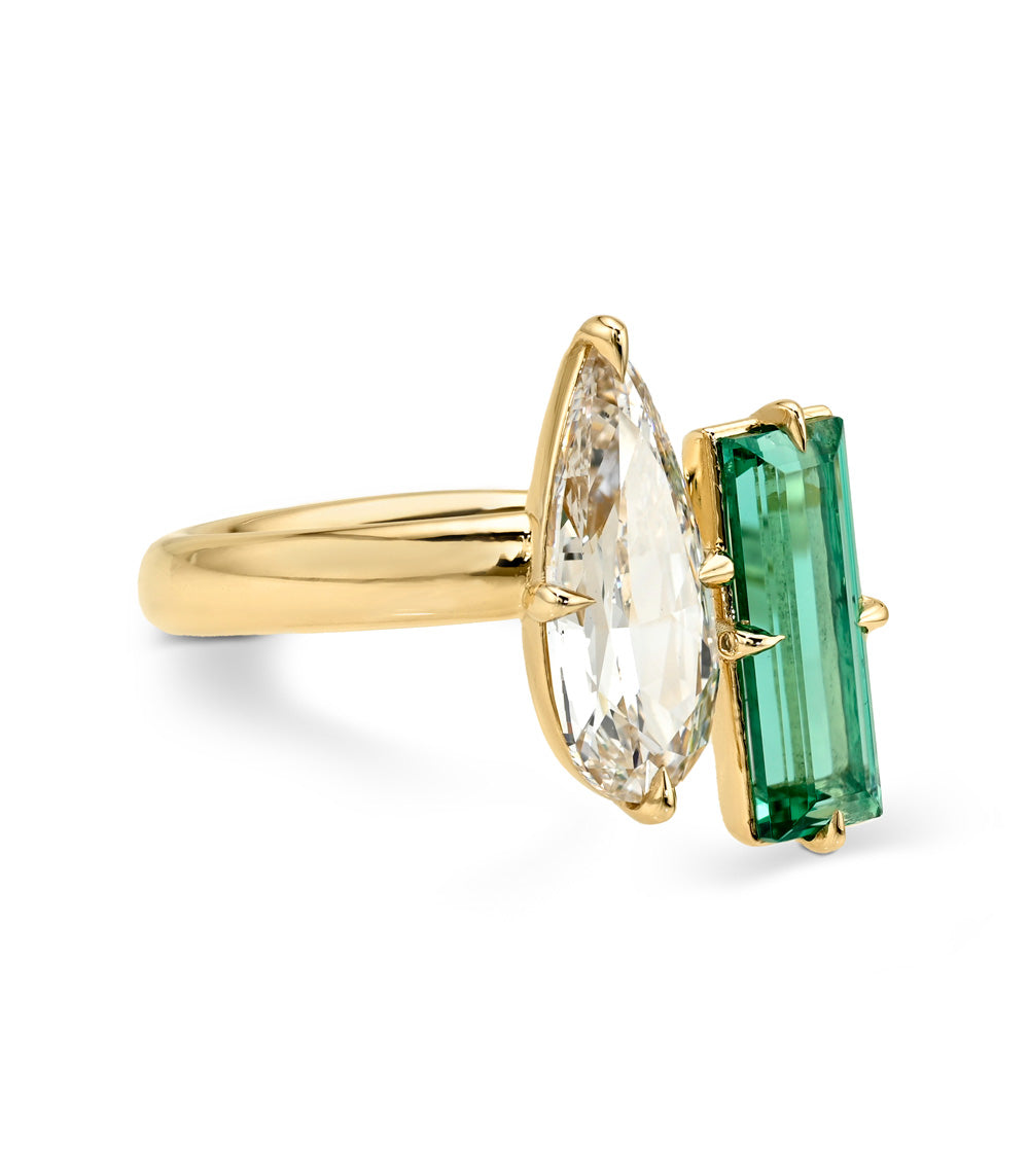 Eirene Toi et Moi by Sofia Kaman gold 2 stone engagement ring with green emerald cut and clear marquise