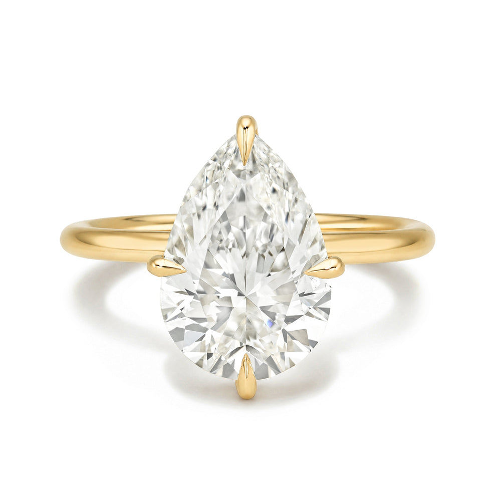 Billie Sofia Kaman engagement ring with lab grown diamond marquise center on gold band