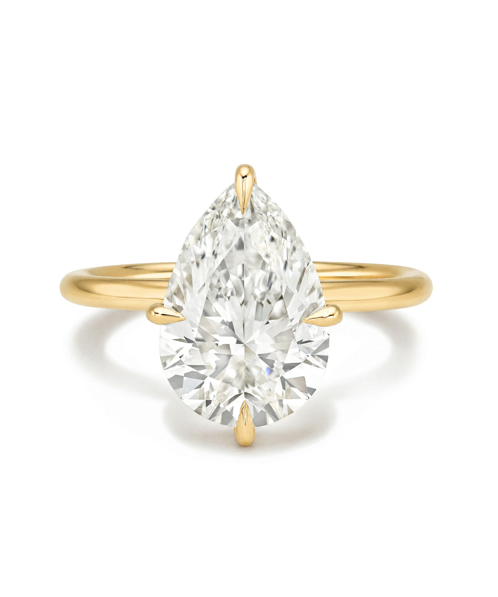 Billie Sofia Kaman engagement ring with lab grown diamond marquise center on gold band