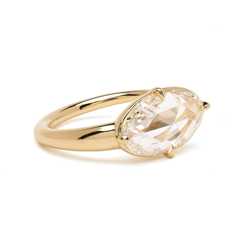 Sloane Sofia Kaman gold engagement ring with oval clear diamond solitaire setting, understated sparkle