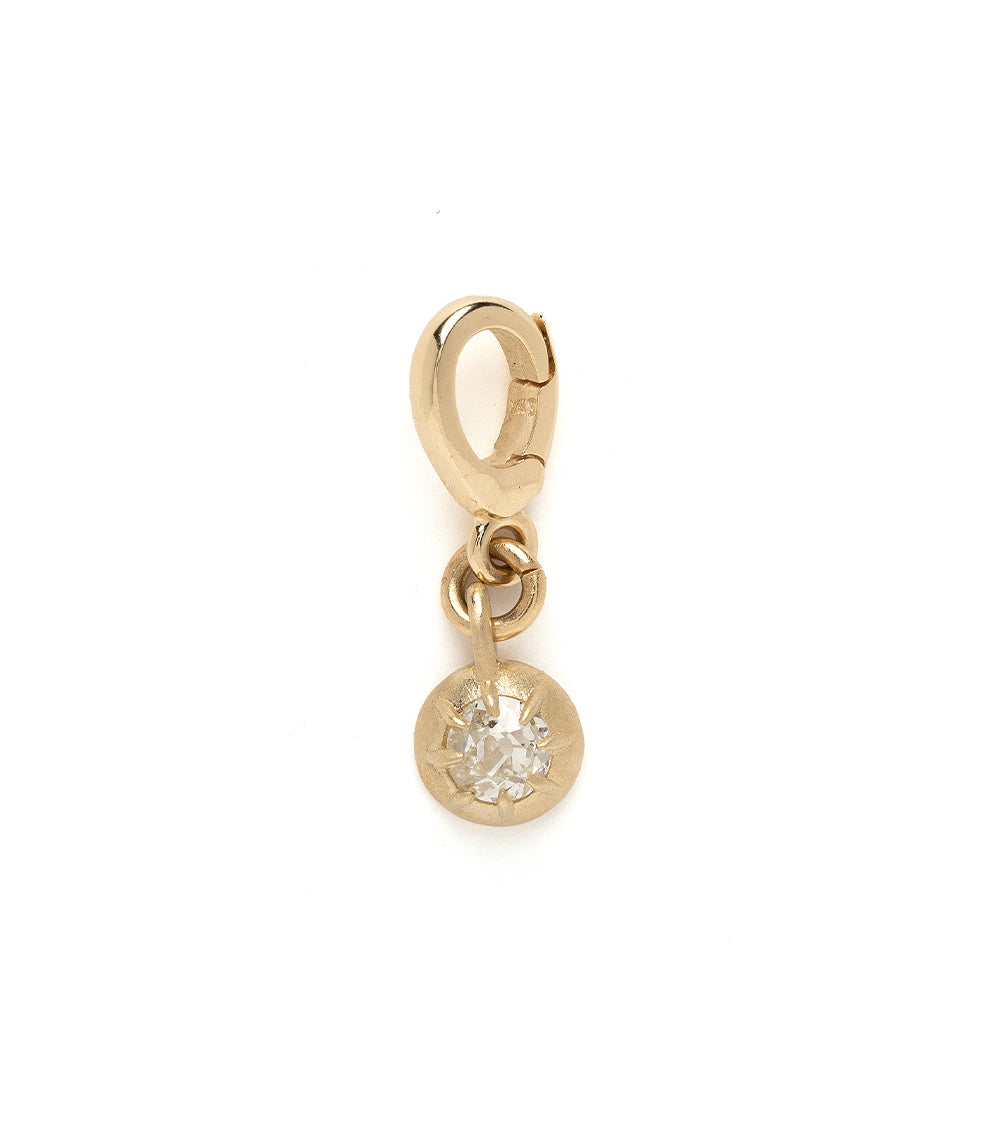 Cora Mini Charm by KM-P11 gold charm with dangling round crystal, shiny matte finish on white background