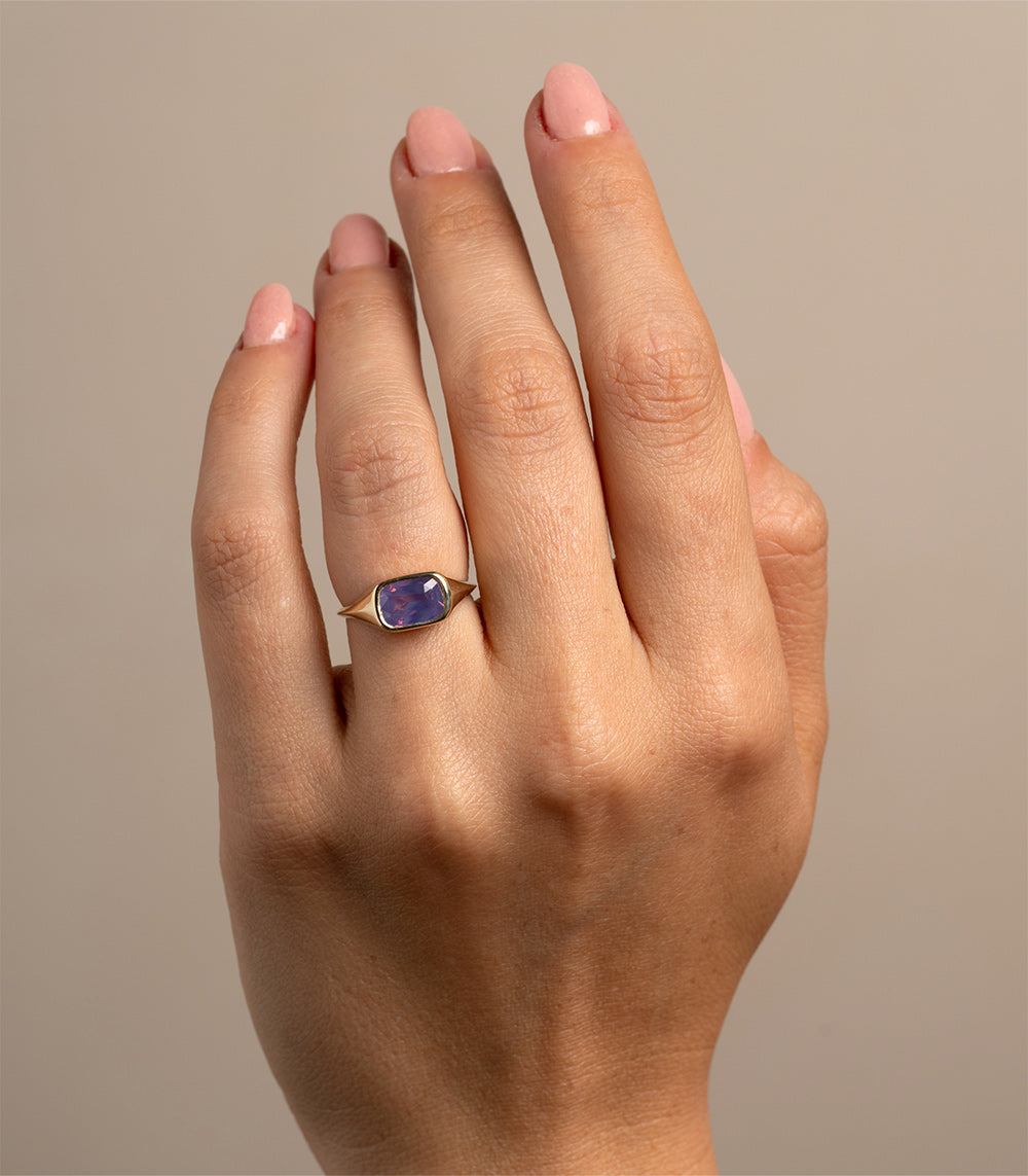 Tristan by SK-R113-CC-PS-2.01 understated gold ring with dark blue square gemstone on hand