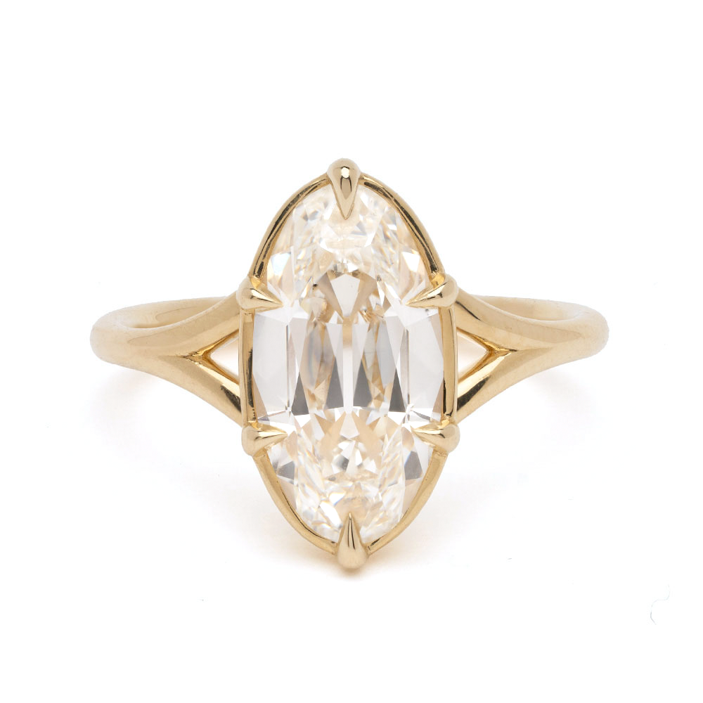 Marlow Sofia Kaman engagement ring in gold with marquise white diamond center and openwork sides