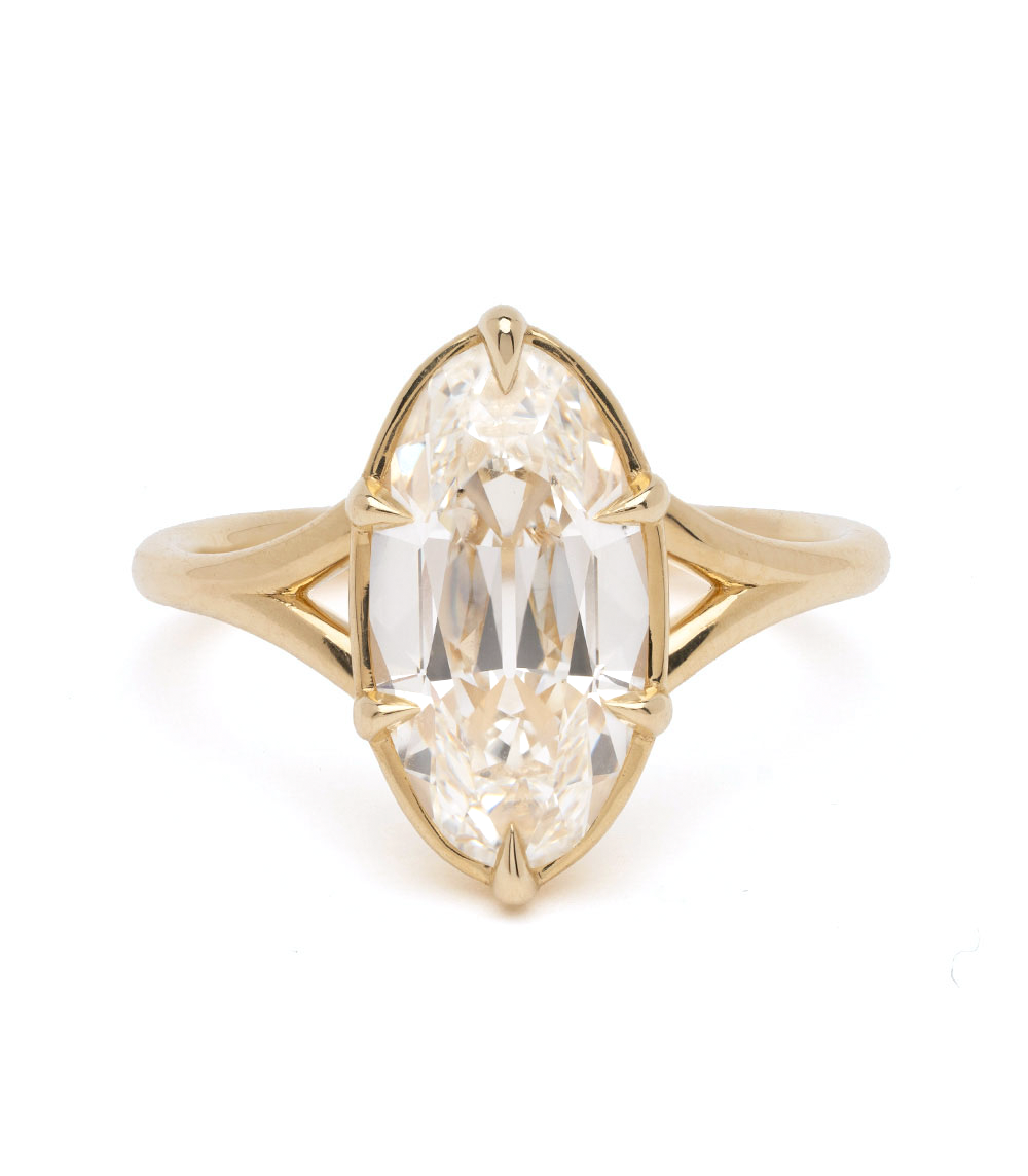 Marlow Sofia Kaman engagement ring in gold with marquise white diamond center and openwork sides