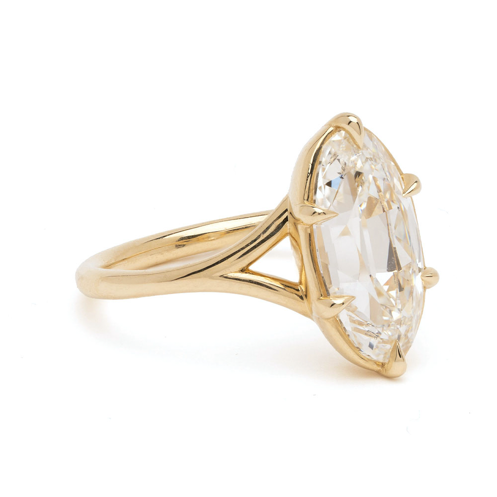 Marlow by Sofia Kaman unique engagement ring in yellow gold with oval-cut diamond center, sleek setting