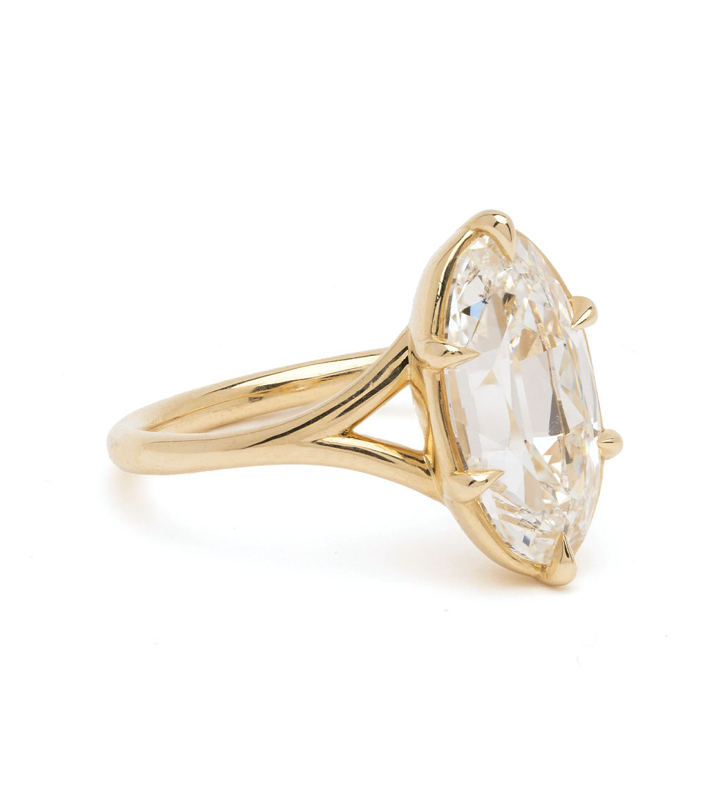 Marlow by Sofia Kaman unique engagement ring in yellow gold with oval-cut diamond center, sleek setting