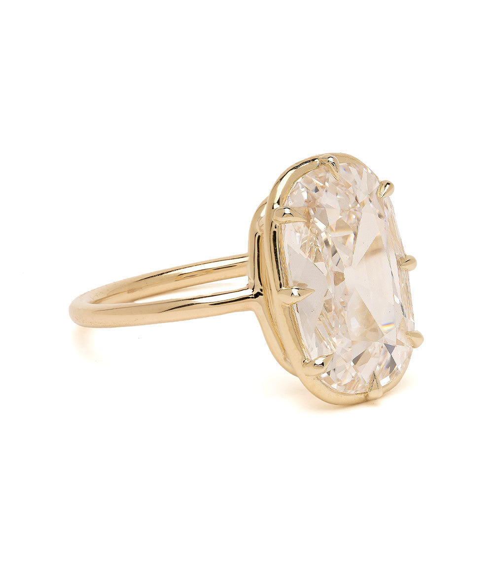 Gigi Sofia Kaman gold lab grown diamond ring with prong-set faceted center stone on display