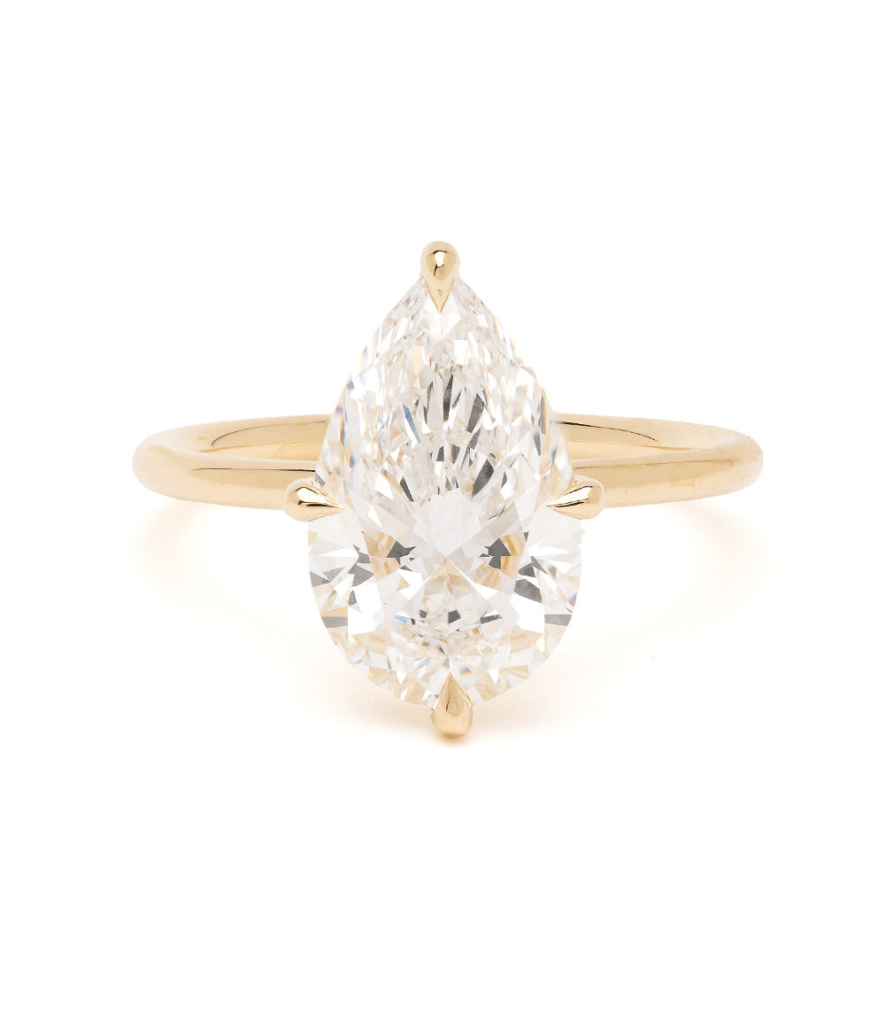 Annika by Sofia Kaman unique engagement ring in gold with understated pear-cut diamond sparkle