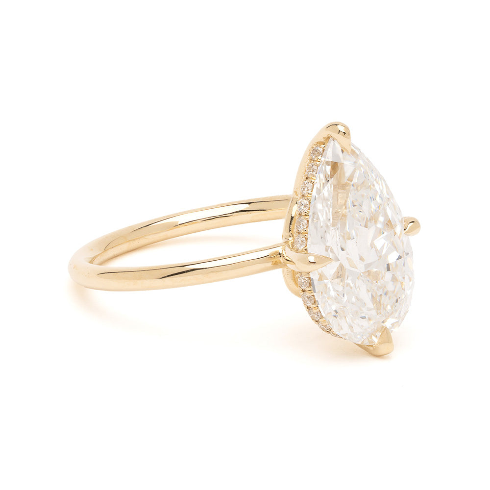 Annika by Sofia Kaman engagement ring in yellow gold with a large faceted clear gemstone
