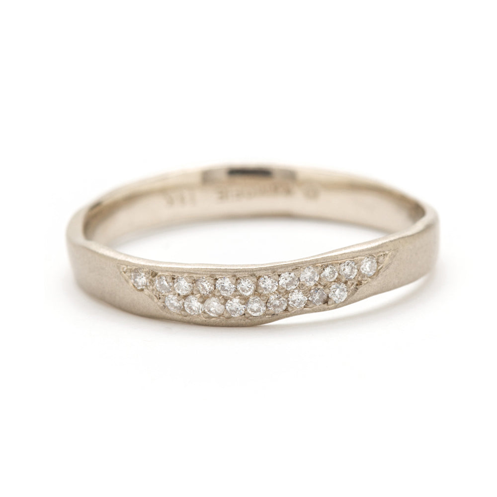 Torn Paper Band by P-R1-Spot 14K white gold band with shiny pavé diamonds in curved channel detail