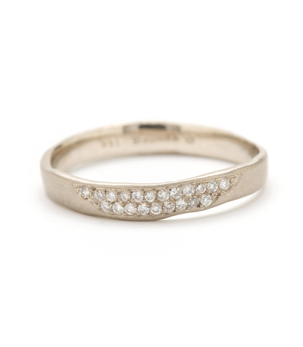 Torn Paper Band by P-R1-Spot 14K white gold band with shiny pavé diamonds in curved channel detail