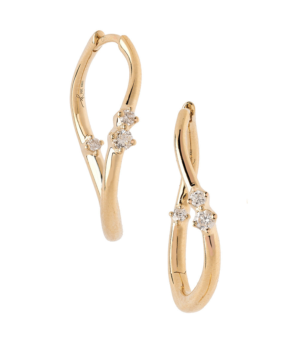 Medium Melt Hoops by ML-E3 gold hoop earrings with shiny matte finish and sparkling stone settings.