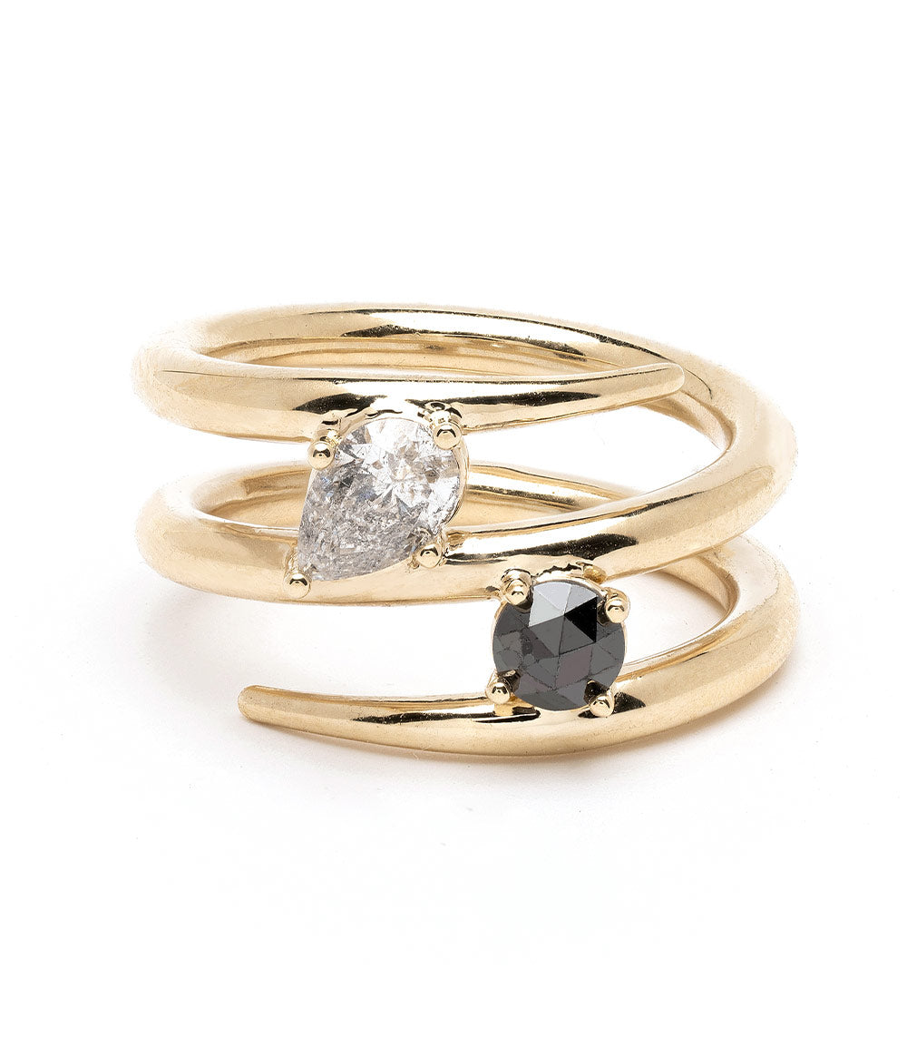 Triple Coiled Band by A-R42 in gold tone with clear oval diamond and black stone, triple stacked coils