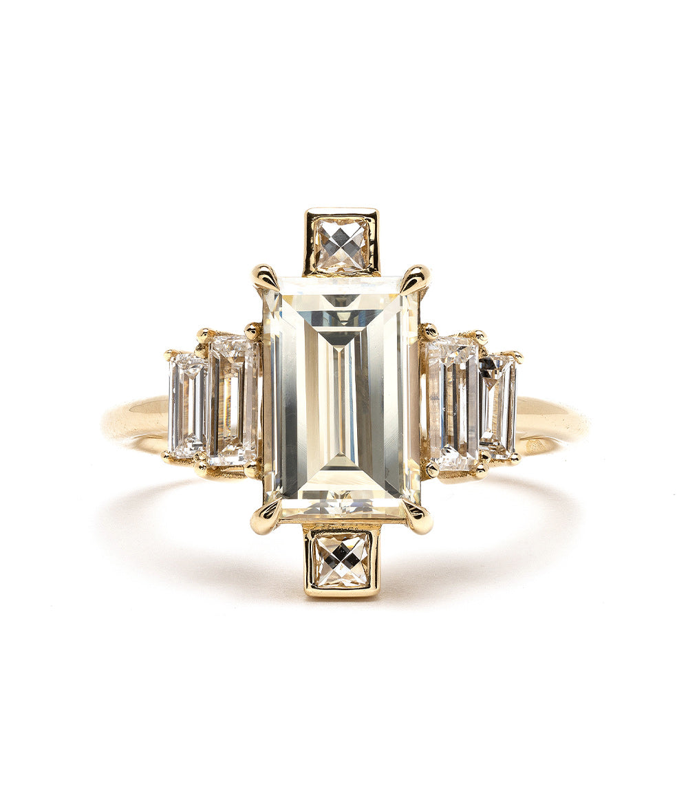 Xena by SK-R90 engagement ring in yellow gold with emerald-cut center and baguette side stones