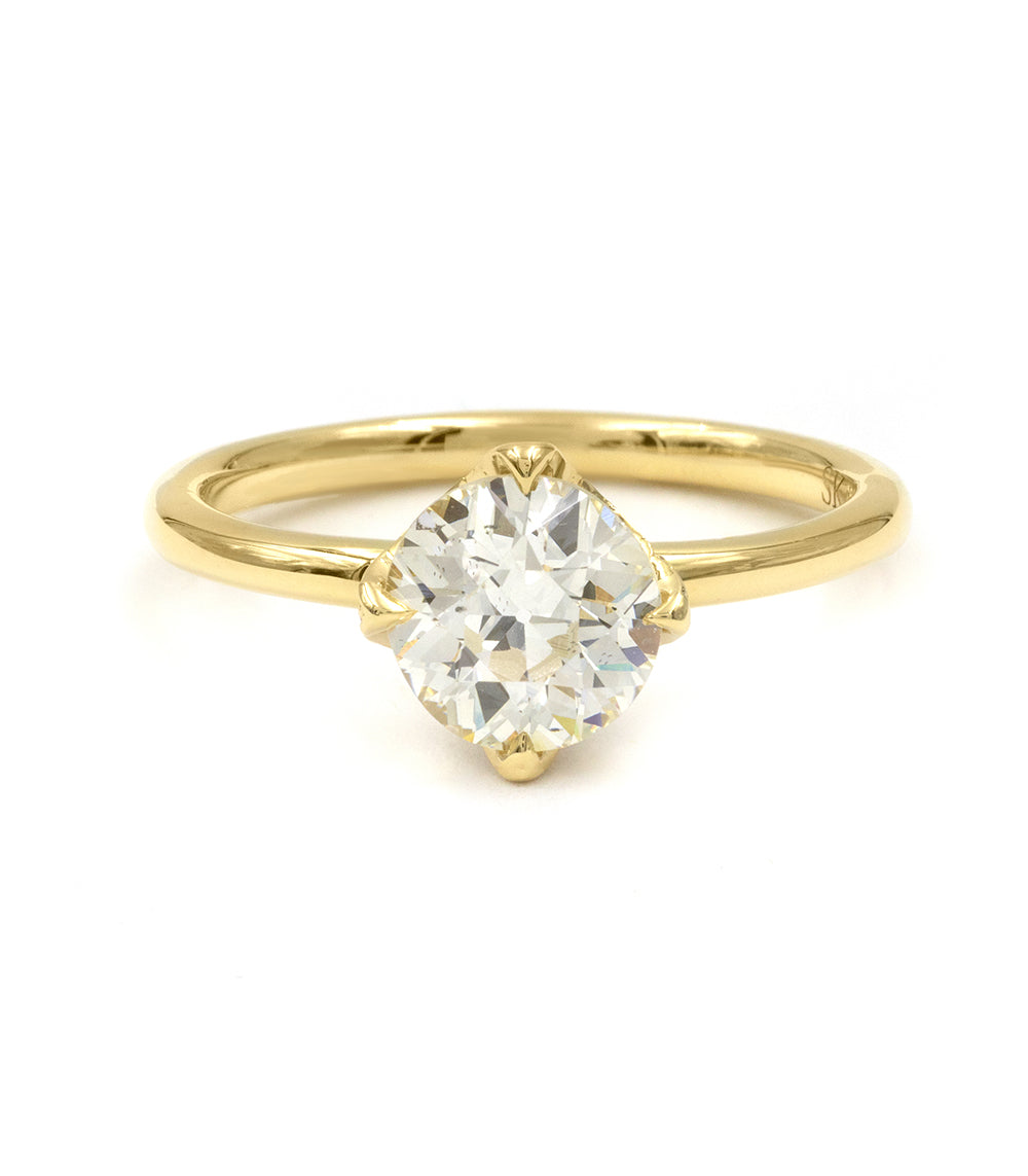 Spiky Crown EL-R18-OEC-WD-MD understated gold engagement ring with single pear-cut diamond on plain band