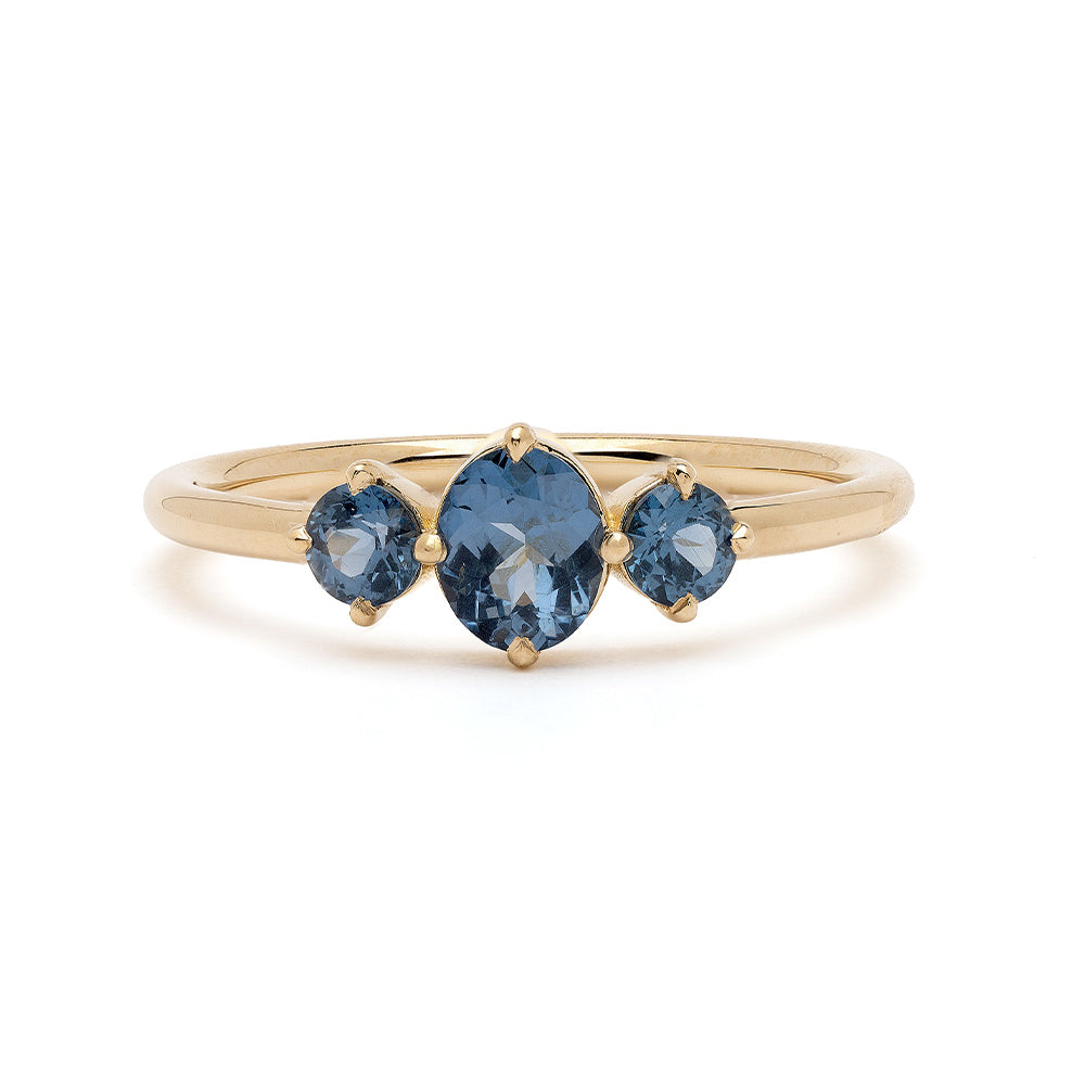 Claudette Gemstone Stacking Band by SK-R68B-3-RB-CS-0.60 in gold with three blue gemstones, sleek setting