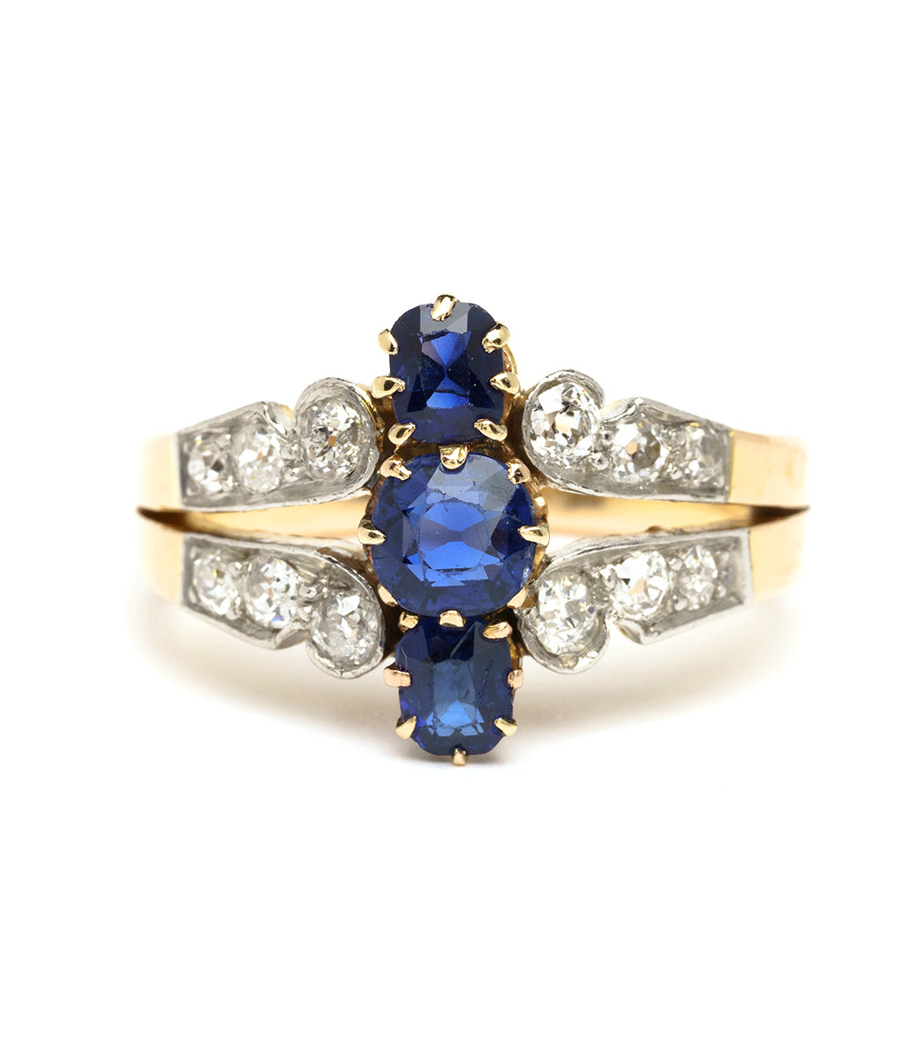 We May Be Royal VC-R177 ring in gold with oval blue center stones and clear side stones