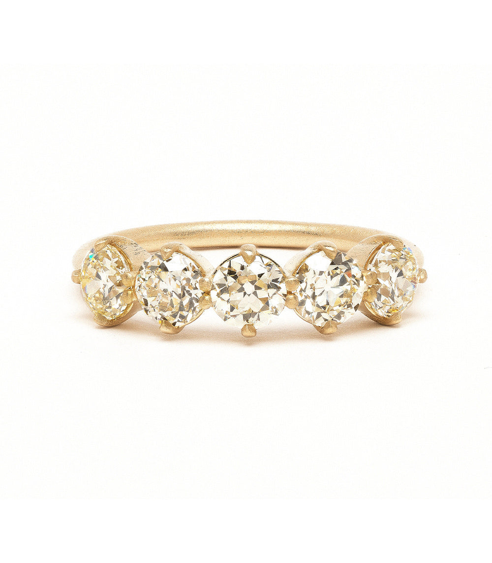 Claudette 5 Stone Band SK-R68-Band-1.68 gold band with five clear stones, prong-set profile.