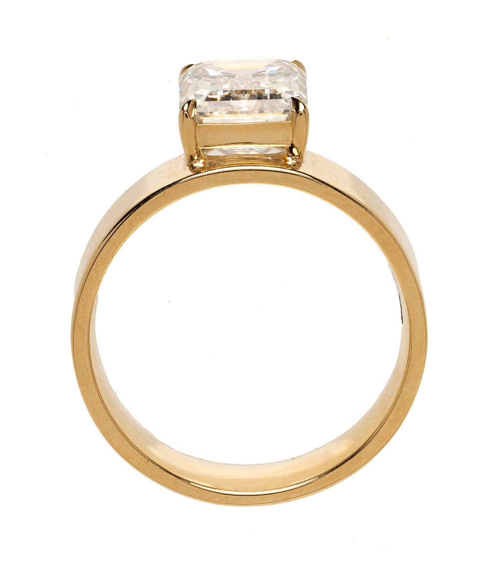 Ashton SK-R118-LGD-EC-WD-3.10 gold ring with clear rectangular stone in prong setting
