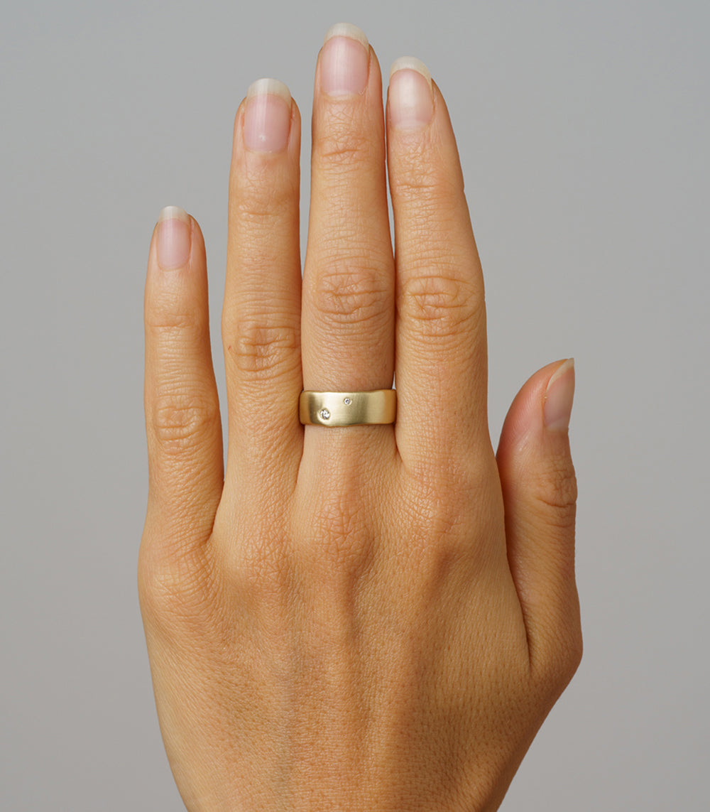 Between You and Me P-R3-TM men's ring band in gold with shiny matte finish and small stones