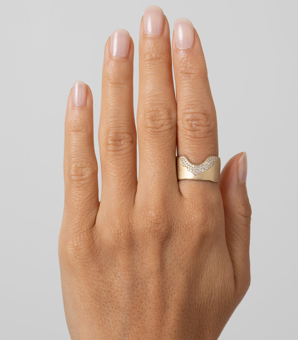 Rolling Hills II by P-R13-B, shiny yellow gold band with sculpted diamond motif on finger