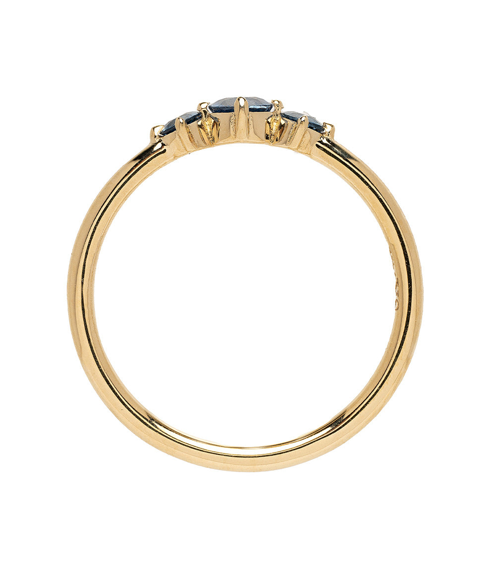 Claudette Gemstone Stacking Band SK-R68B-3-RB-CS-0.33 gold ring with small blue gemstone accents.