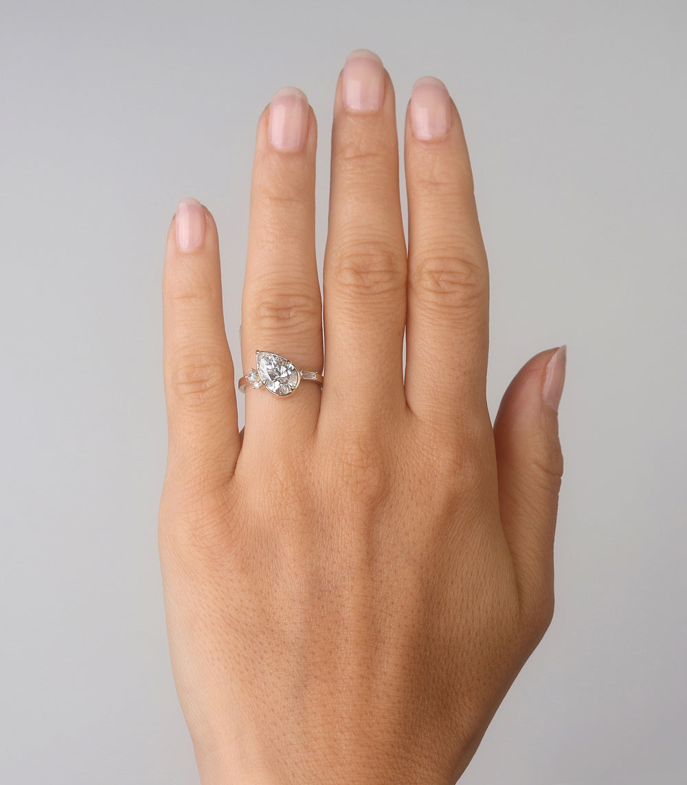 Sydney SK-R96-LGD-PS-WD-2.85 silver diamond engagement ring with teardrop center stone and side stones