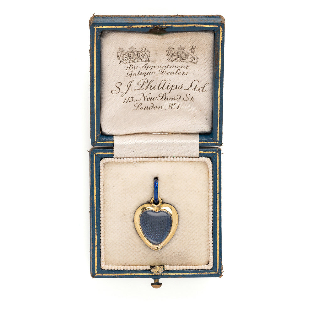 True Blue VC-N68 gold heart charm with blue enamel in a hinged presentation box, vintage style.