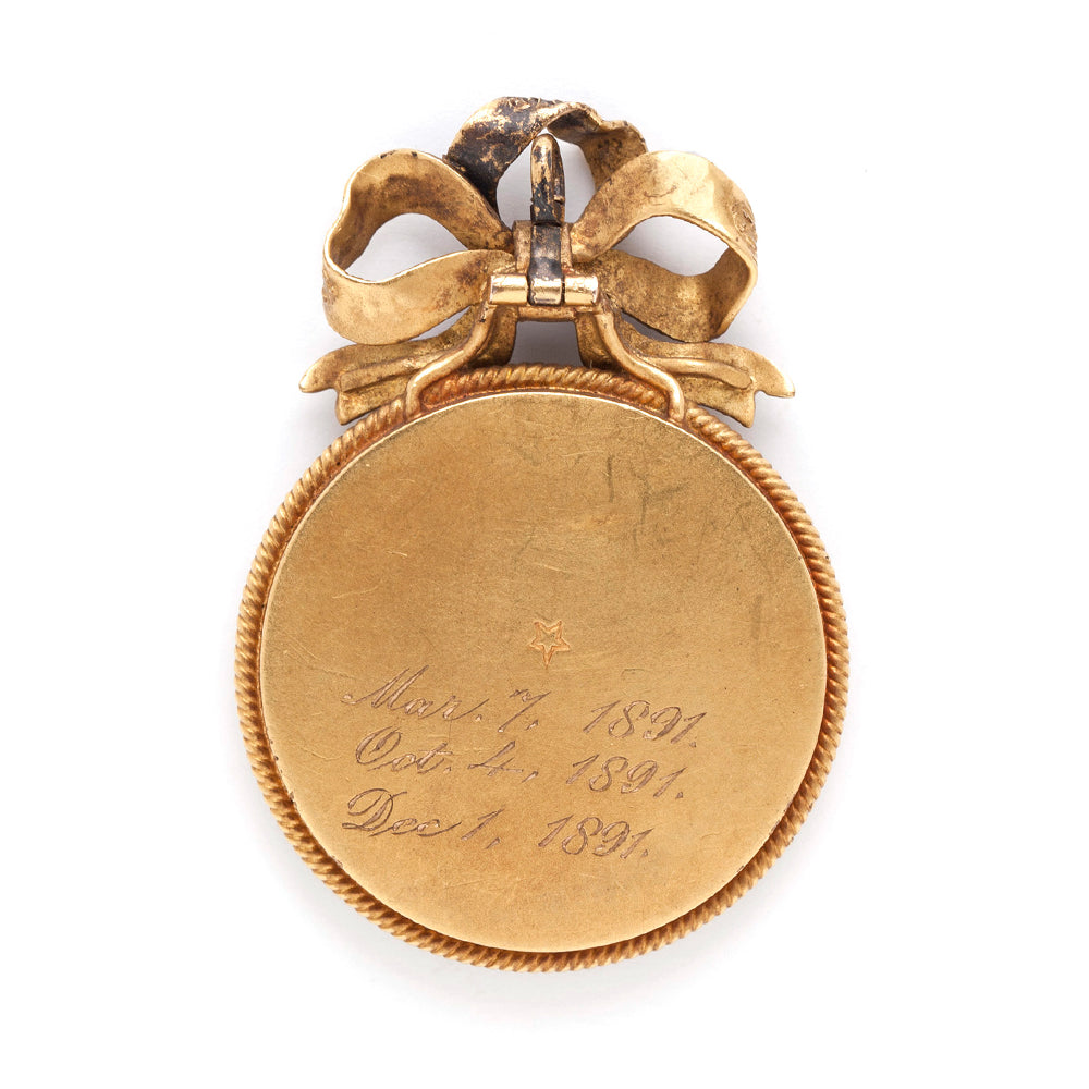 My Fair Lady Pendant by VC-P5 gold-tone heart pendant with bow detail and engraved round back medallion