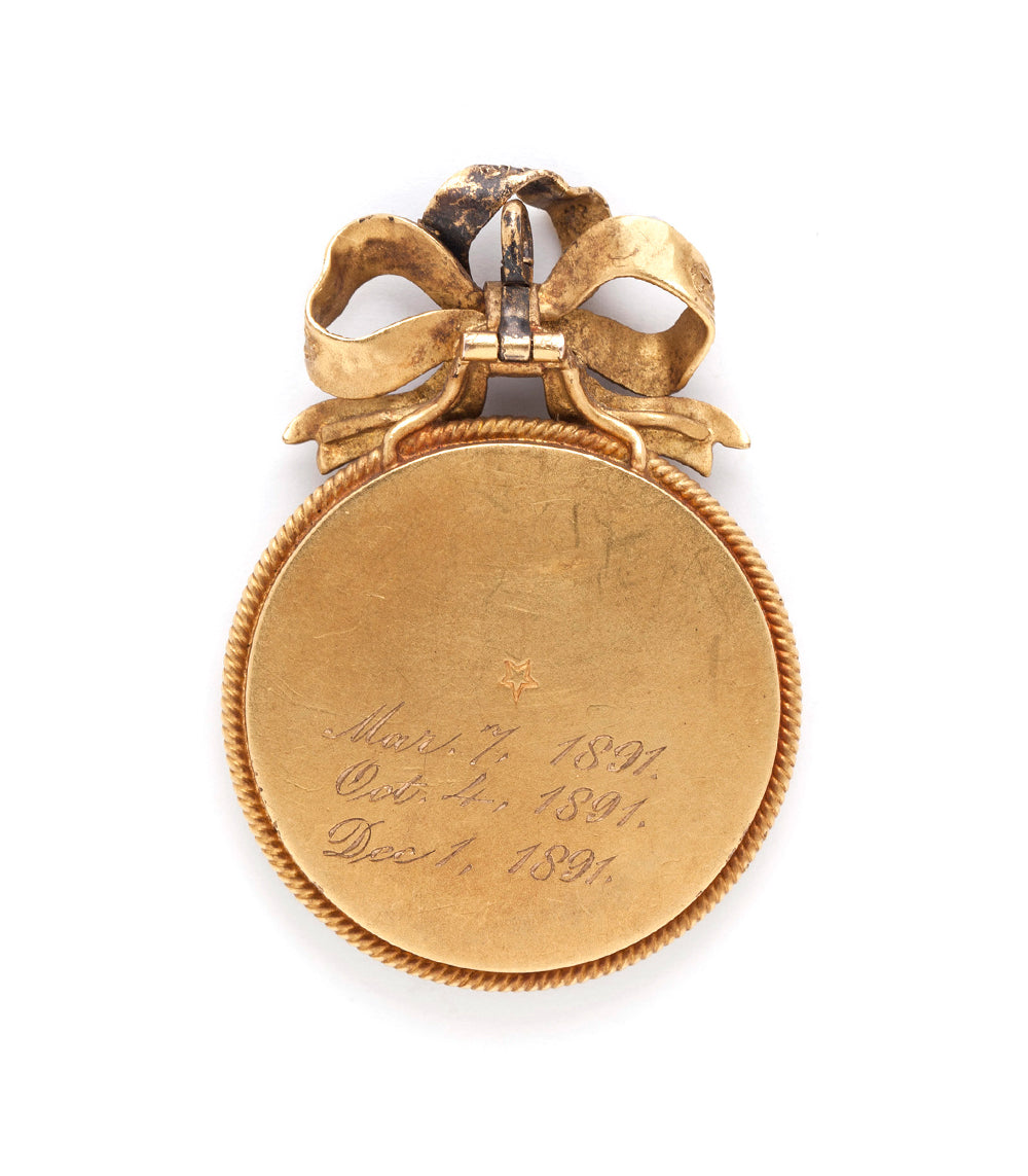 My Fair Lady Pendant by VC-P5 gold-tone heart pendant with bow detail and engraved round back medallion