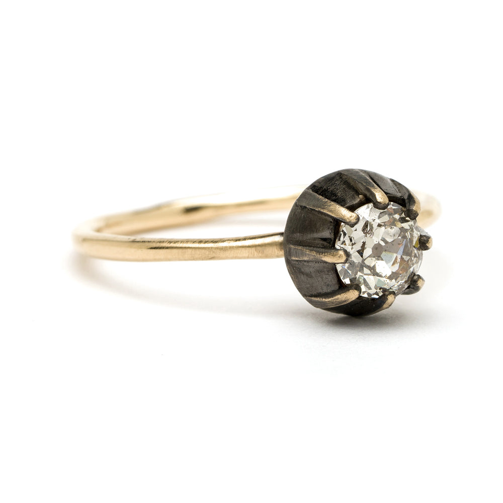 Cora by SK-R28-OMC-CD-MD unique engagement ring in gold with a round diamond and understated dark setting