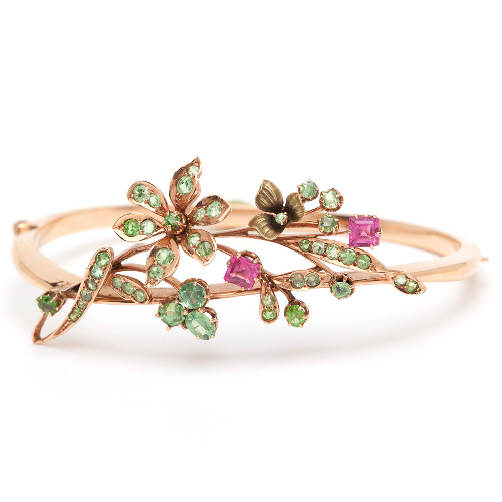 Whimsical Flower Bangle VC-B10 rose gold bangle with green and pink floral stones in a vine setting