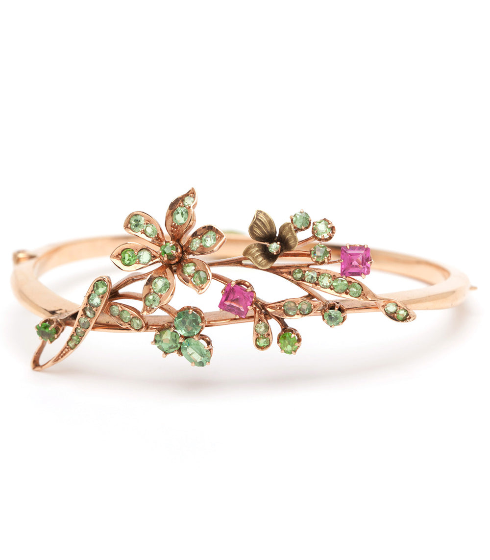 Whimsical Flower Bangle VC-B10 rose gold bangle with green and pink floral stones in a vine setting