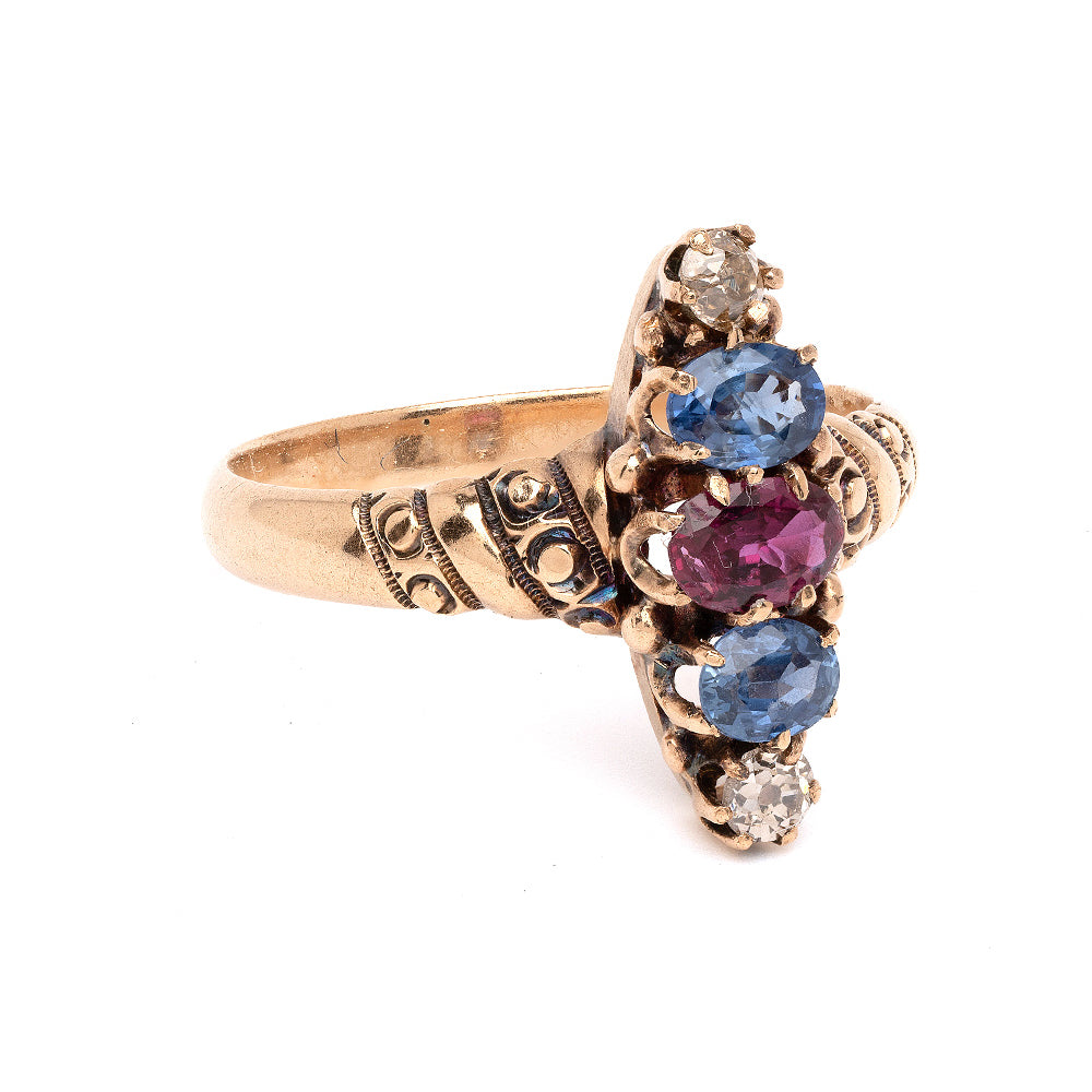 Candy Stripe VC-R187 asymmetrical engagement ring in gold with blue, pink and clear gemstones