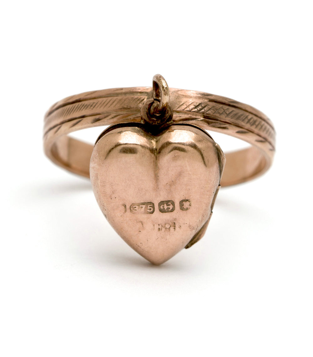 Dangling Heart Locket VC-R121 gold locket with heart pendant and engraved face, close-up on white background