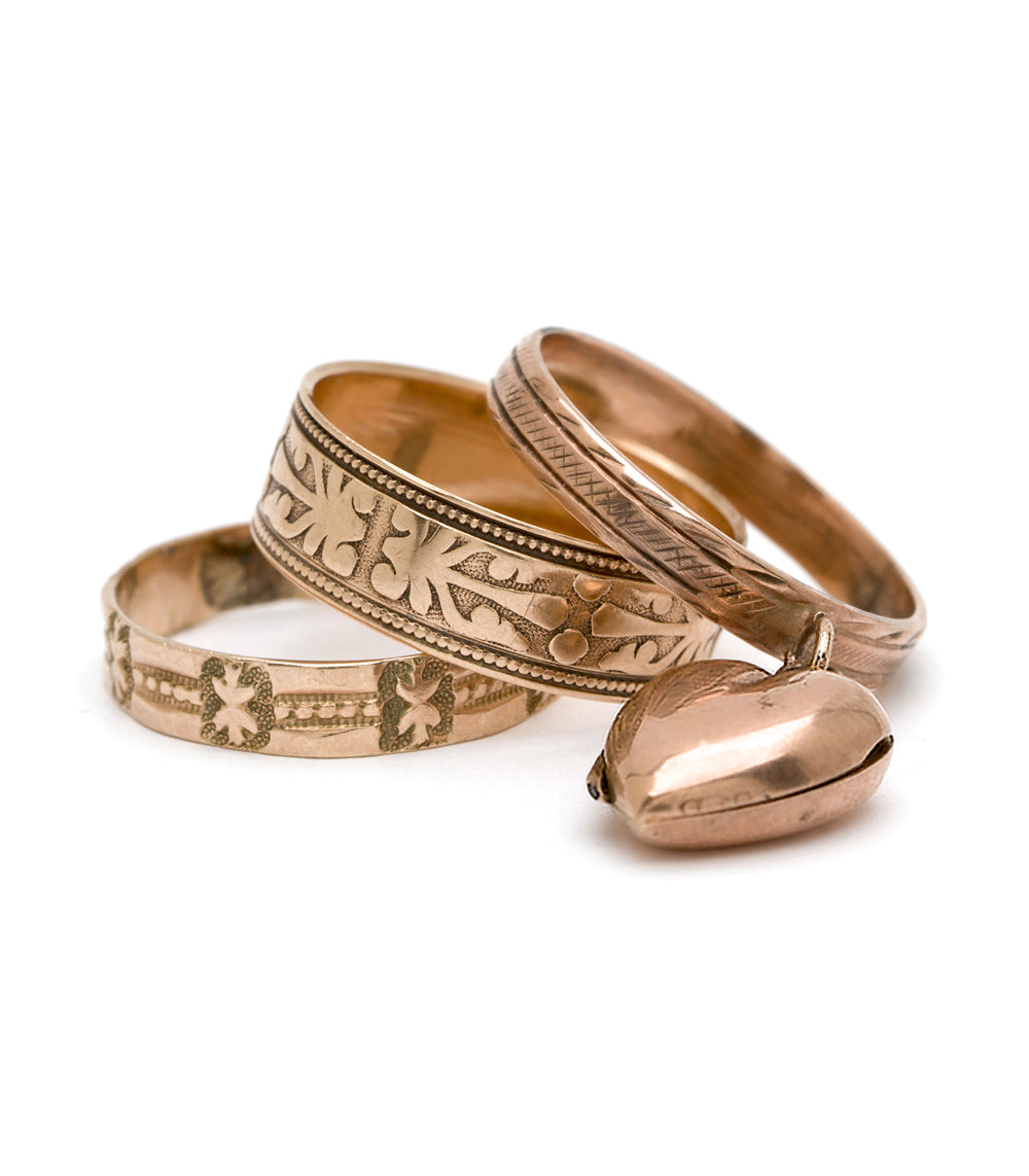 Dangling Heart Locket VC-R121 rings in gold tone with engraved hearts and textured bands on white background