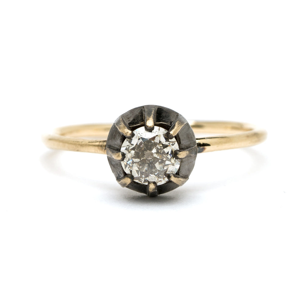 Cora SK-R28-OMC-CD-MD understated gold engagement ring with a unique engagement ring style and round diamond