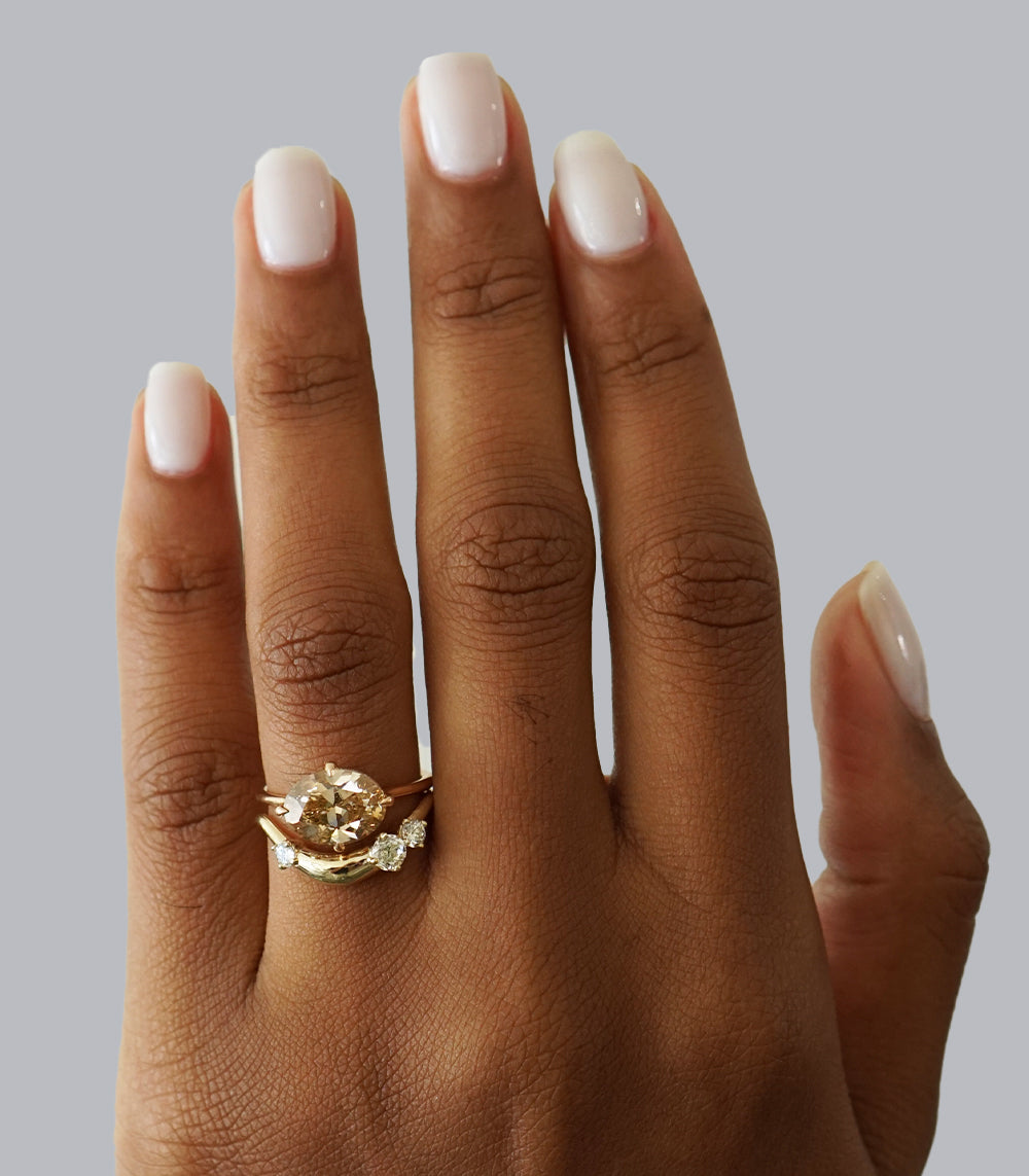 Small Melt Band by EGB-R1-3D-LG in shiny 14K yellow gold band, worn on finger