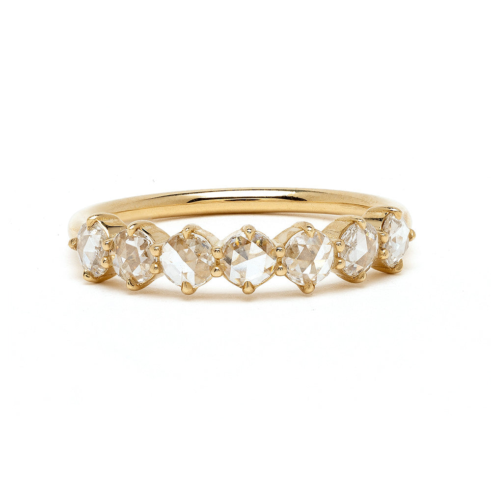 Claudette 7 Stone Band by SK-R68-7-ND-RRC-WD-0.42 in shiny 14K yellow gold with seven clear stones.