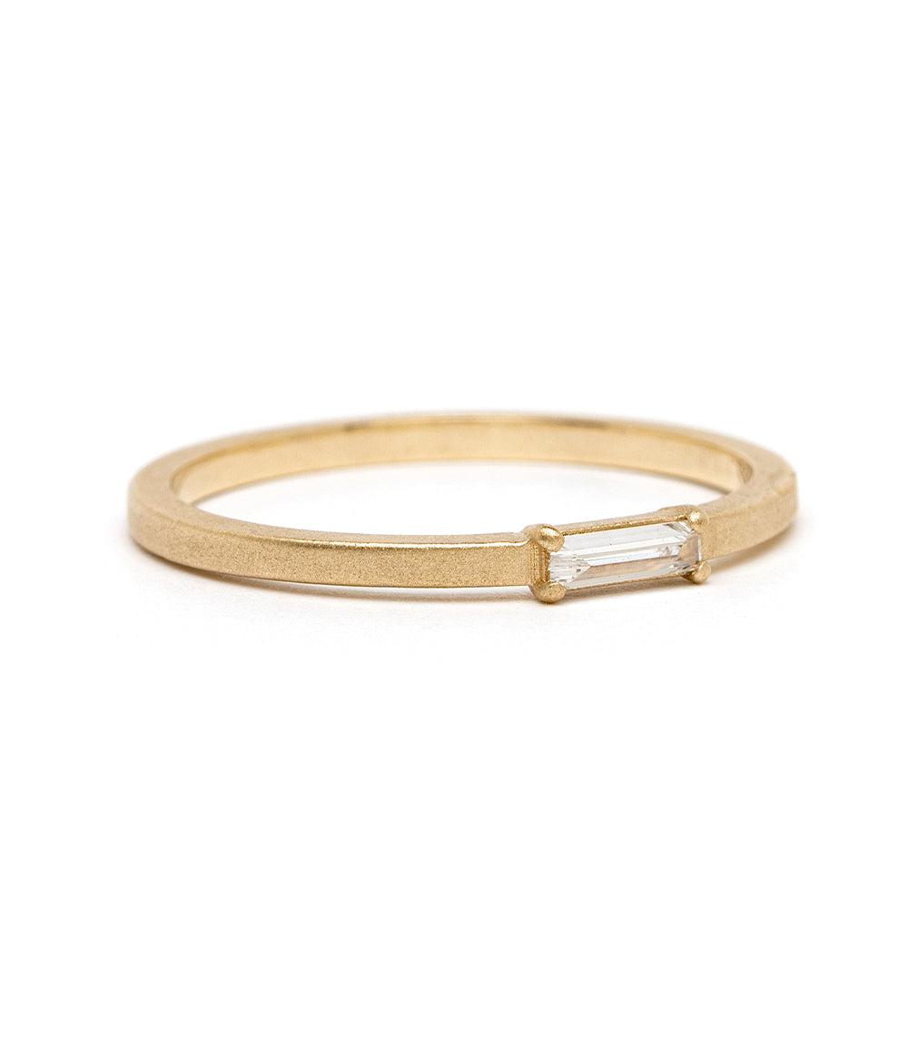 Stardust SK-R78 engagement ring in shiny 14K yellow gold with a clear baguette-cut stone