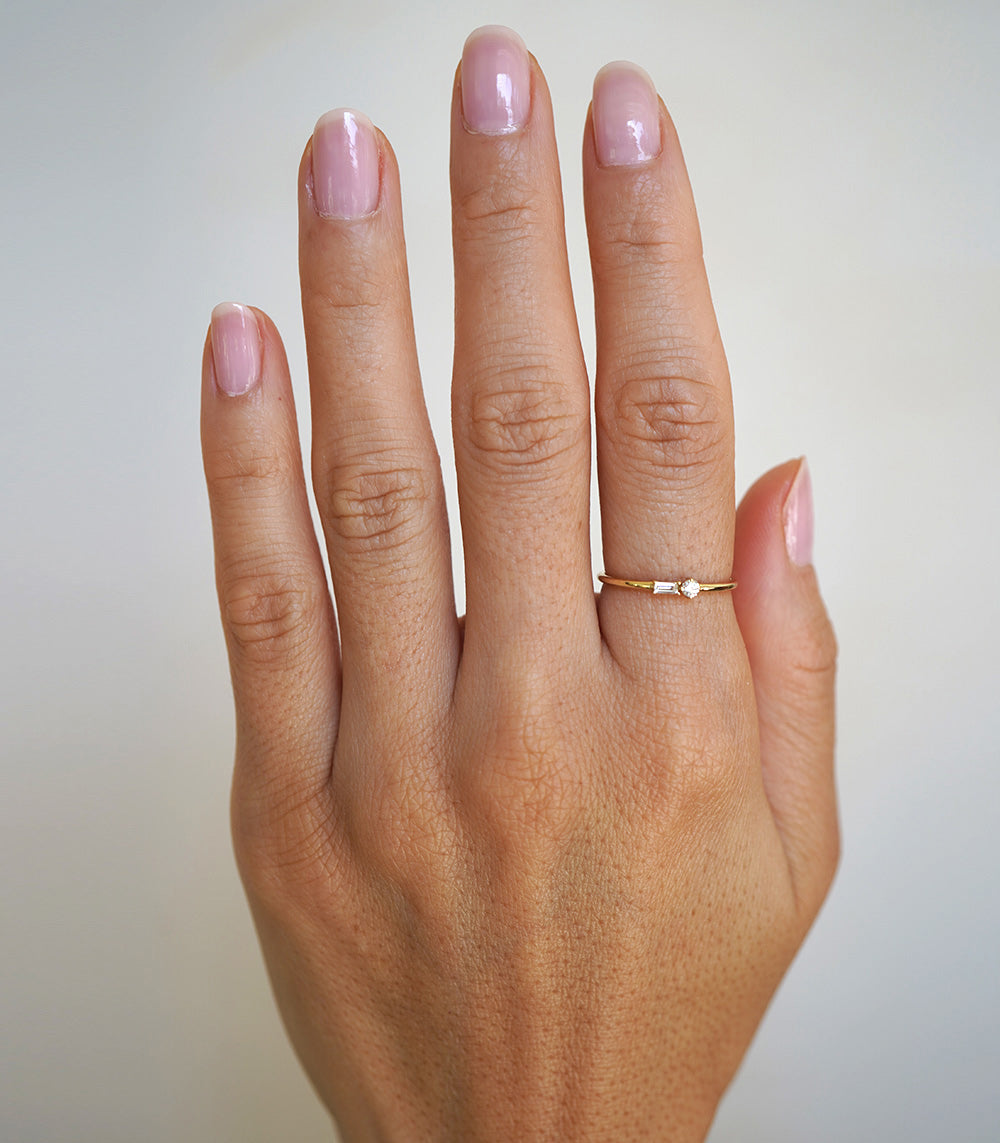 Confetti Band SB-R6 shiny 14K yellow gold ring band with small diamond accents on a hand