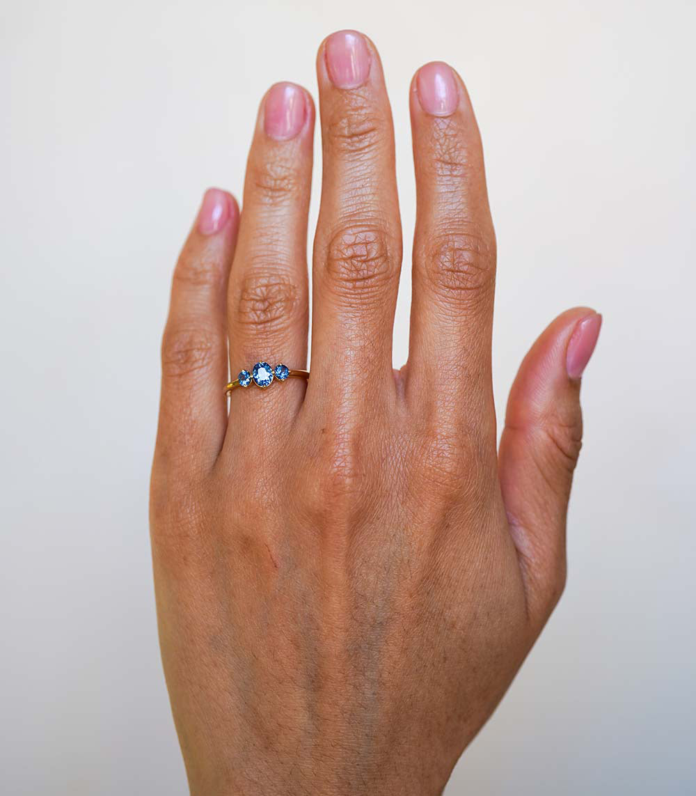 Claudette Gemstone Stacking Band SK-R68B-3-RB-CS-0.60 in gold with 3 stone engagement ring blue gems