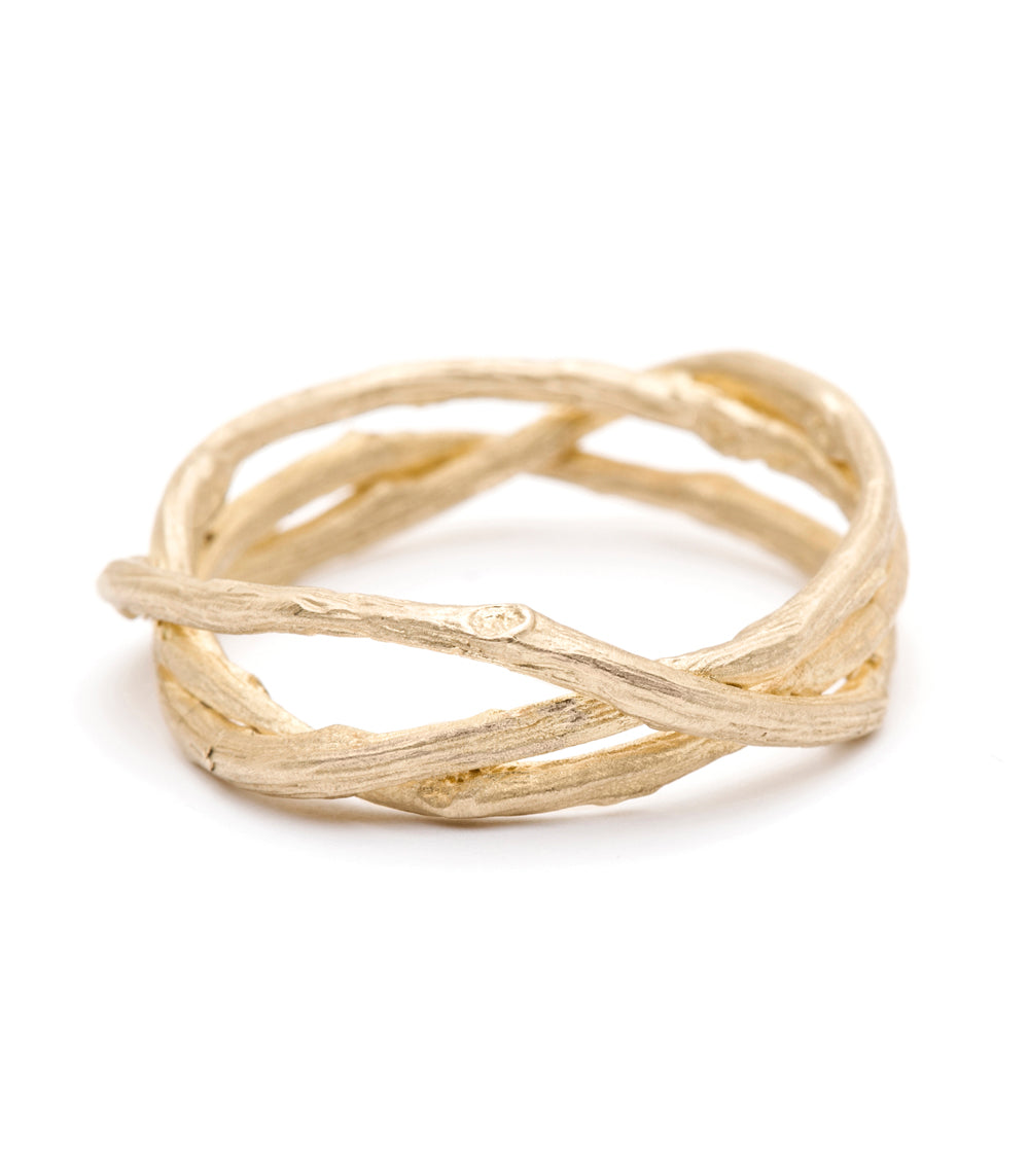 Woven Branches by M-R5 ring in gold woven branches, shiny and matte finish on white background